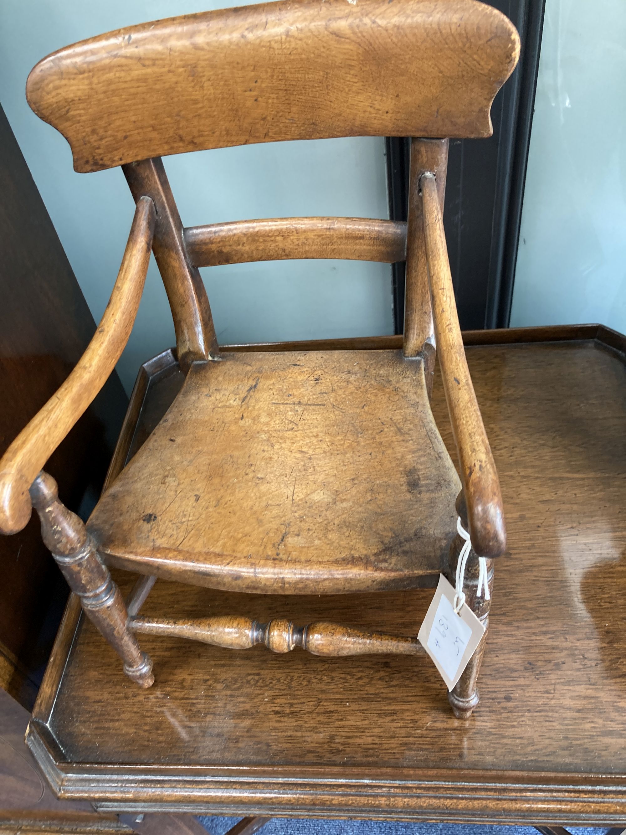 A Victorian mahogany apprentice elbow chair, width 26cm, depth 22cm, height 35cm